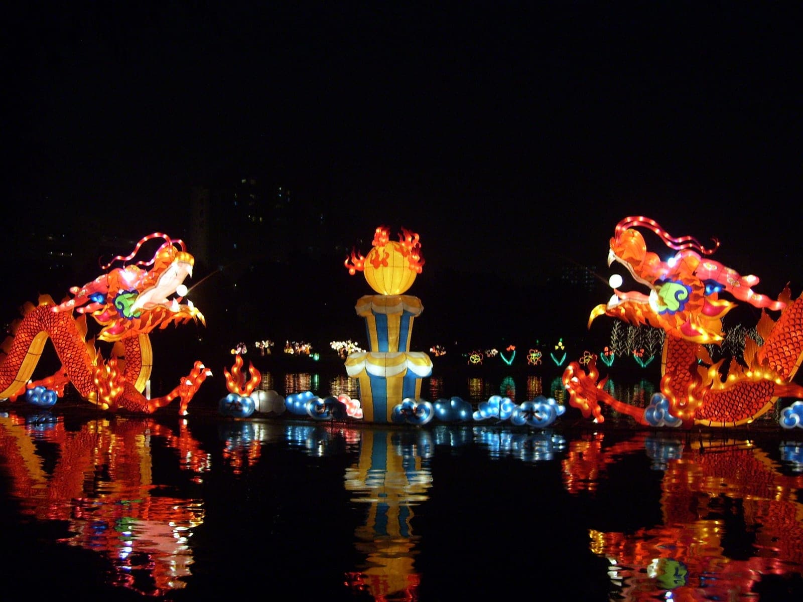 Vibrant Mid-Autumn Festival celebration with illuminated paper lanterns and crowds gathering during evening festivities in Beijing