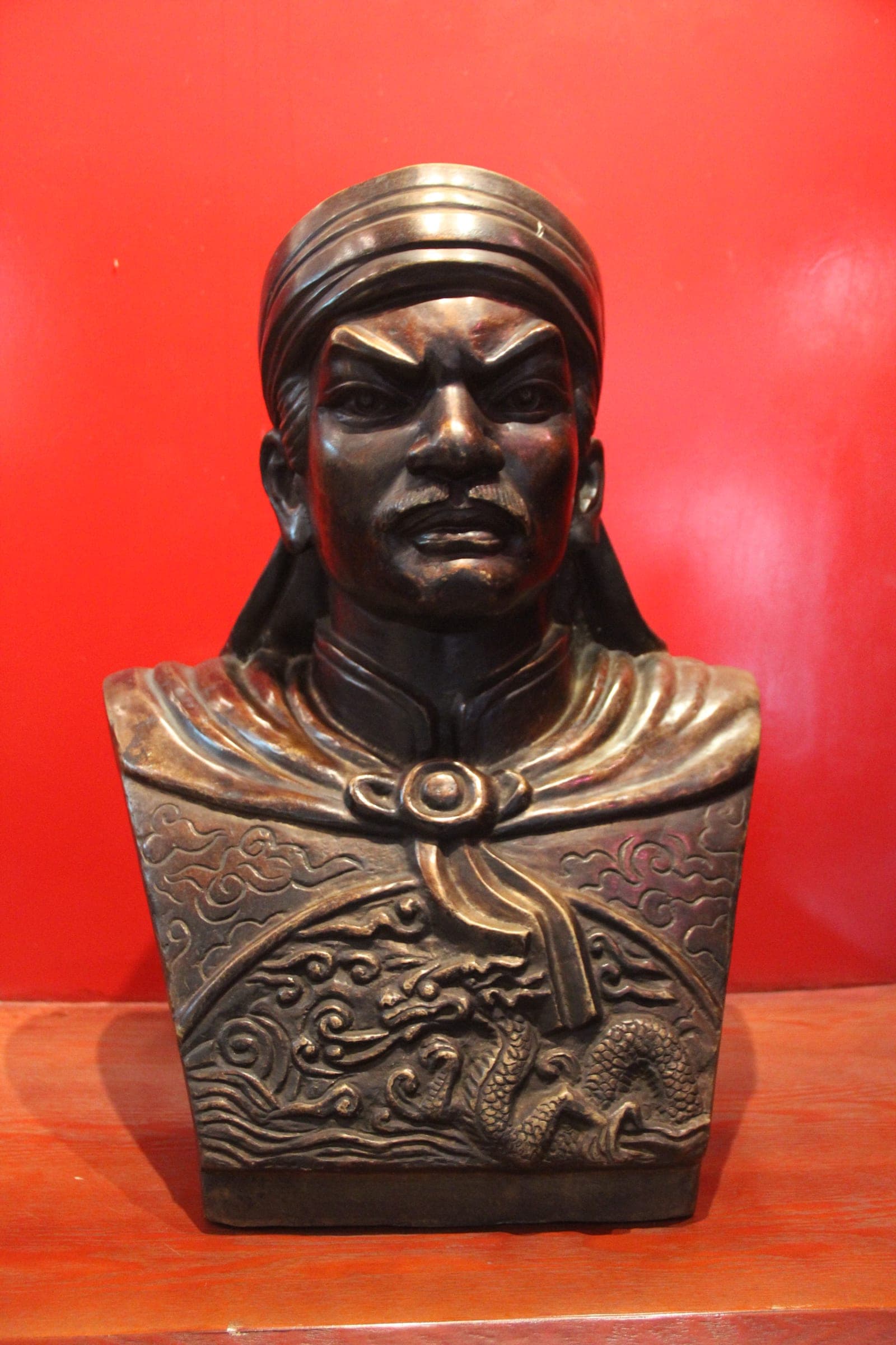 Portrait of Nguyễn Huệ, also known as Quang Trung, wearing traditional Vietnamese royal attire from the late 18th century.